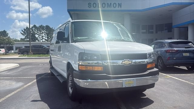 2025 Chevrolet Express Passenger 1LT in Summit White — front three-quarter view