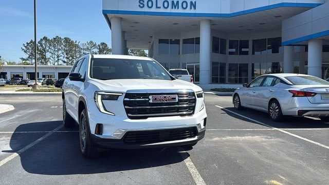 2025 GMC Acadia Elevation in Summit White — front three-quarter view