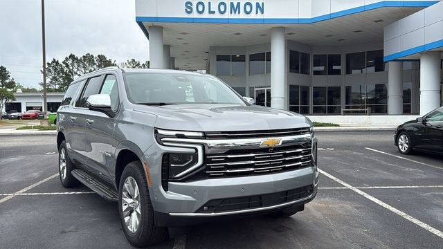 2026 Chevrolet Suburban Premier in Sterling Gray Metallic — front three-quarter view