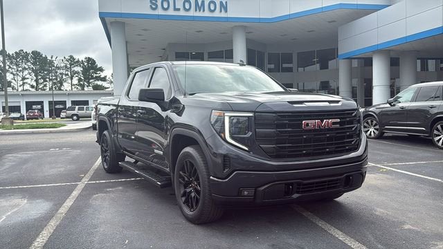 2024 GMC Sierra 1500 Elevation in Titanium Rush Metallic — front three-quarter view