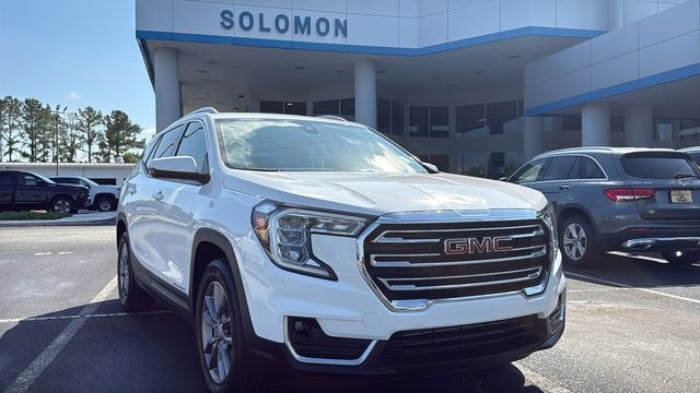 2023 GMC Terrain SLT in Summit White — front three-quarter view
